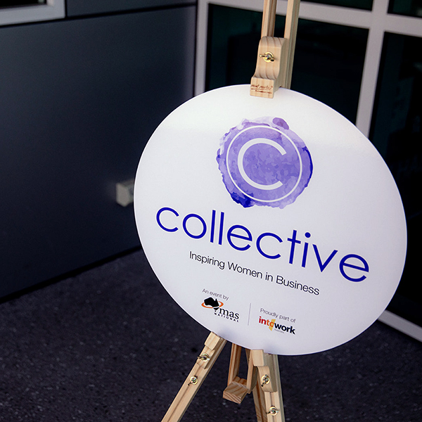 Collective: Inspiring Women in Business sign on an easel out the front of an event.